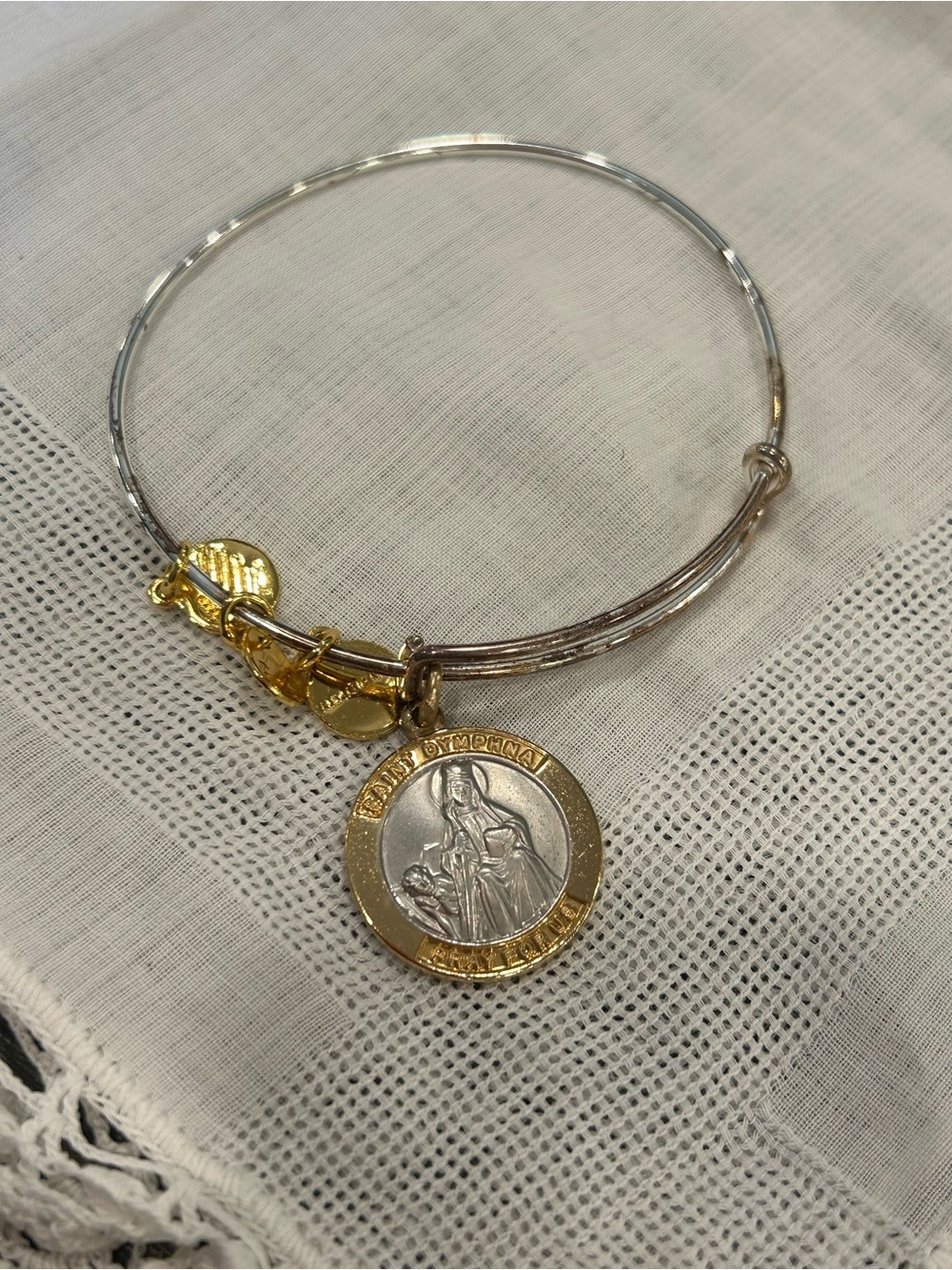 Alex and Ani Two-Tone Gold and Silver Bangle with “Saint Dymphna” Charm